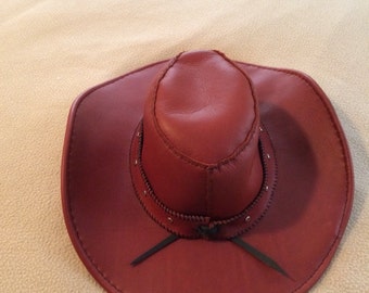 Handmade reddish brown leather hat