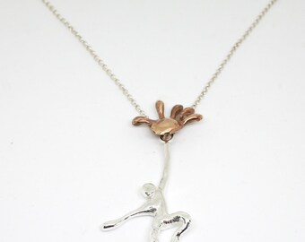 U-Mano: bronze and silver pendant