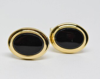 Gold tone cuff links