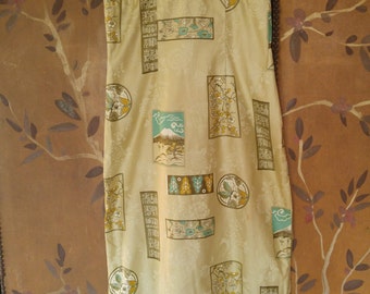 80s Hawaiian maxi dress with large bow at back by Hawaiian Casuals by Stan Hicks