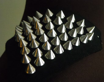 1 pair of shoulder studs / spike trims, silver spikes on black felt