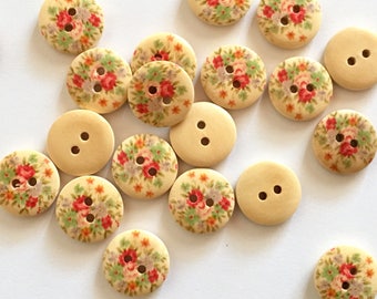 5 wooden buttons with painted floral pattern