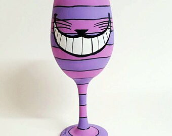 Wonderland inspired hand painted wine glasses.