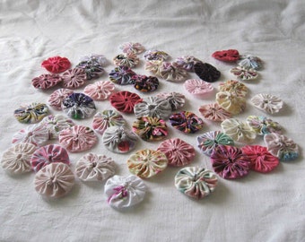 50 pink yo yos, purple yo yos, pink yoyos, purple yoyos, fabric yo yos, fabric yoyos. patchwork supply, patchwork supplies quilting supplies
