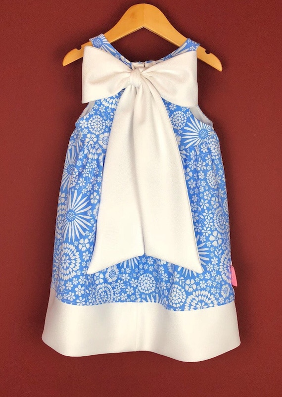 The "Bow-Backed Dress" in Graphic Blue Floral.
