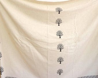 Unbleached cotton fabric with Burgundy border and small black tree pattern