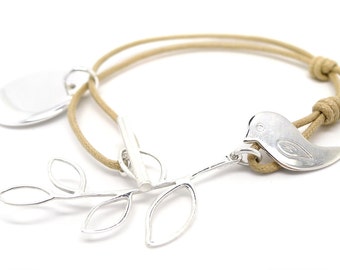 Bird and its arm bracelet