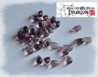 30 drops of purple glass beads