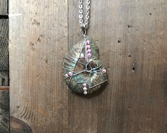 Pendant Ammonite and Swarovski elements for prosperity. Raw fossil and rainbows crystals.