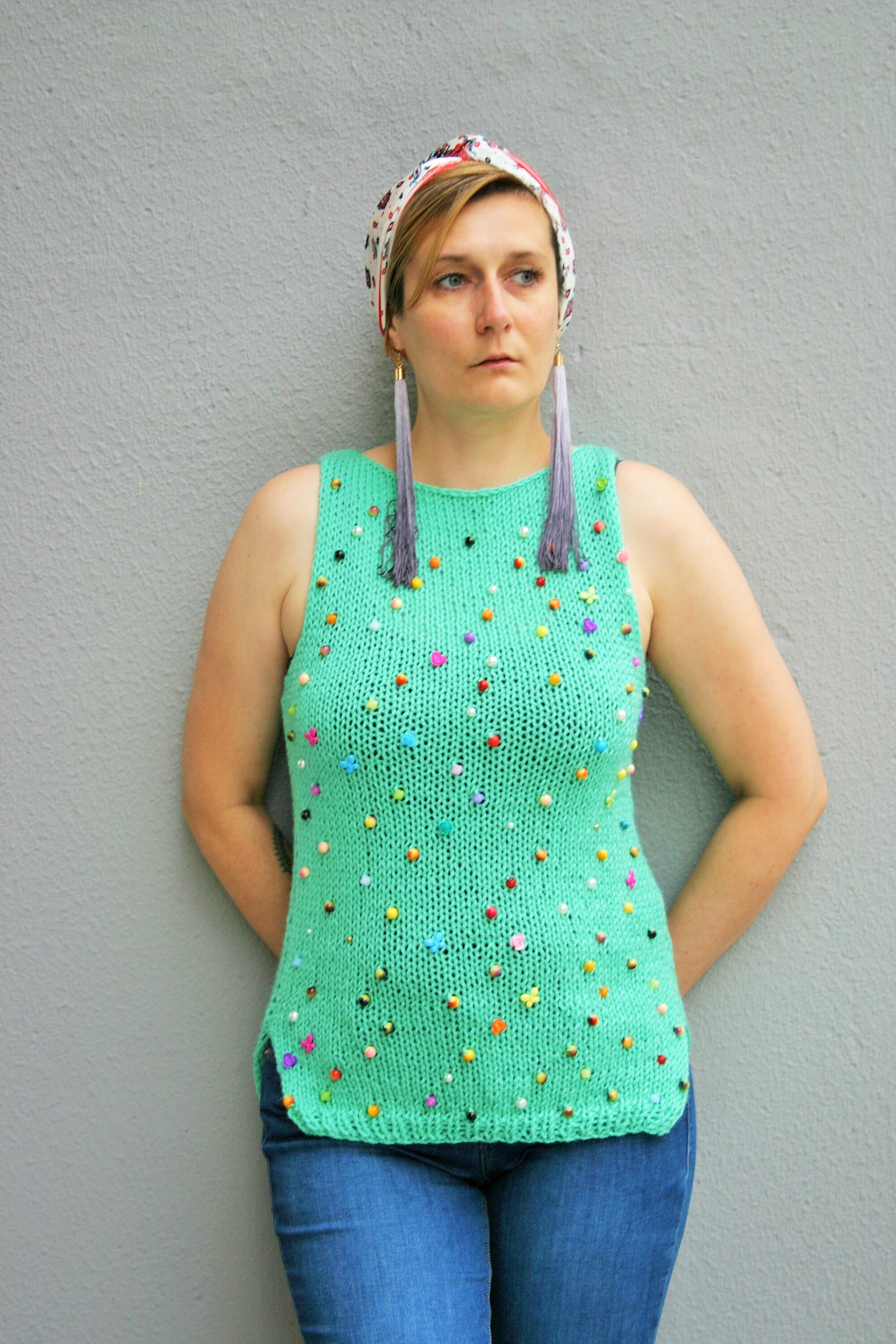 green knitted tank top