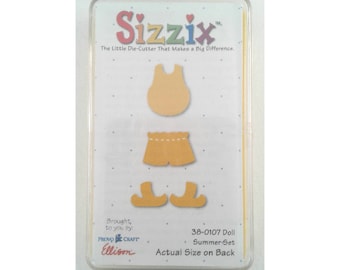 Yellow Sizzix die #38-0107 "Doll Summer Clothes"; in original case; scrapbooking; die cuts; card making; papercraft; shirt, shorts, shoes