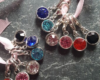 6 knitting or crochet stitch markers . Sparkles