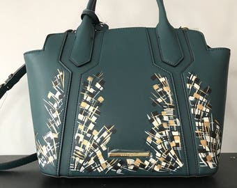 Ivory and gold on forrest green bag