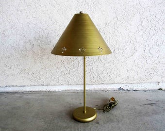 Vintage Mid Century Brass Finish Lamp with Fleur-de-lis Shade. Circa 1960's.