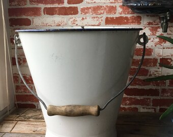 Large bucket in vintage white enamelled sheet. France