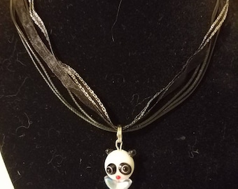Panda bear on black corded necklace