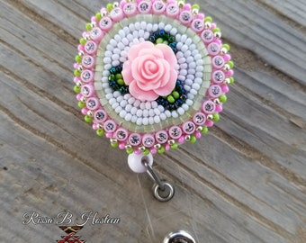 Retractable ID badge holder with clip