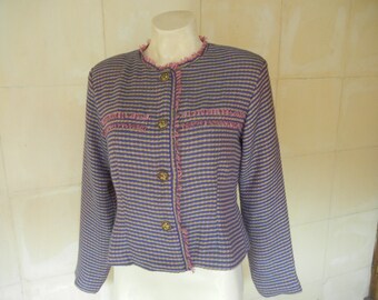 Chanel-style jacket fitted to the waist