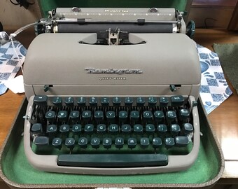 Remington portable typewriter with green keys