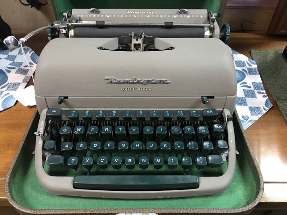 Remington portable typewriter with green keys