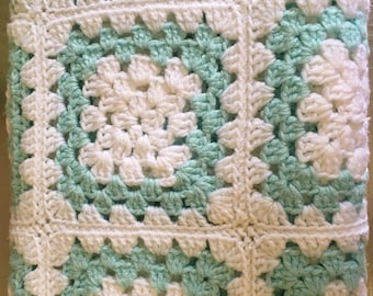 Blue and white granny square baby blanket