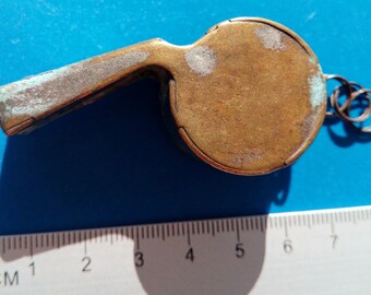Old brass whistle of the 20th century