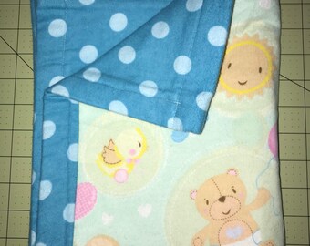 Double sided flannel blanket