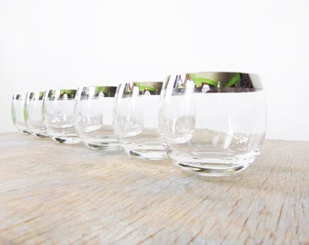 mad men glasses, silver dorothy thorpe roly poly glasses, vintage 1960s barware