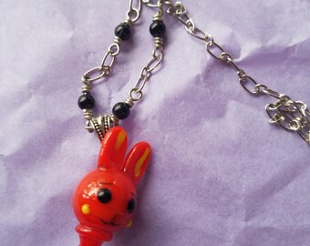 Wacky Orange lampwork Bunny necklace
