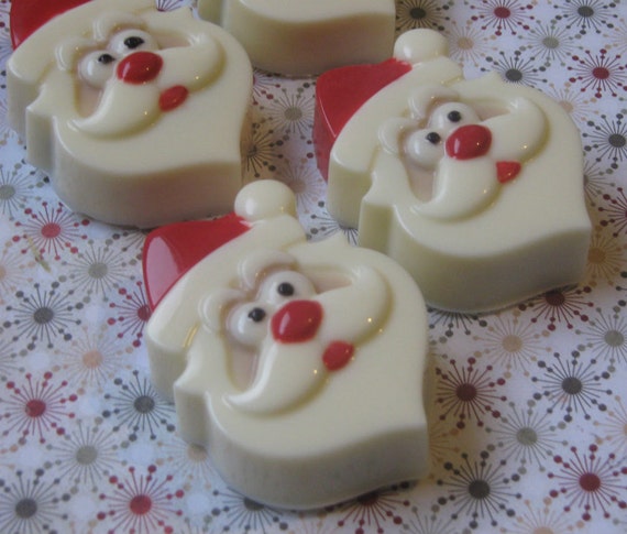 One dozen Santa face chocolate covered sandwich cookie party favor
