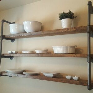 Illustration of Exposed Pipe Shelving For Sale