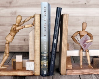 2 wooden bookends with puppets