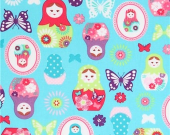 214112 turquoise with Matryoshka butterfly oxford fabric by Kokka