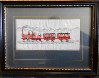antique miniature embroidery of red train on silk, framed,glazed