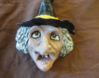 Surprised witch paper mache magnet