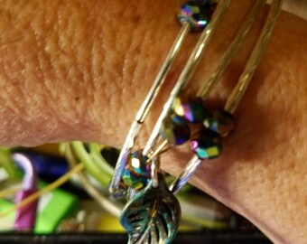 Wire wrapped bracelet woth multi colored beads.