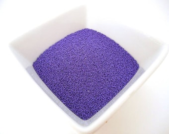 Bag of 10g of Pearlescent purple colored glass