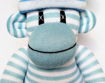 Blue and white striped Sock Monkey with removable pom pom hat ce certified