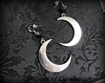 Gothic crescent moon dangle earrings.