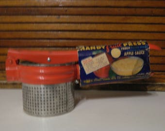 Vintage Fruit press and potato ricer still in original package