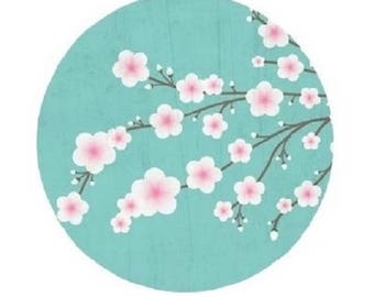 20mm, pink cherry blossoms, green background of water