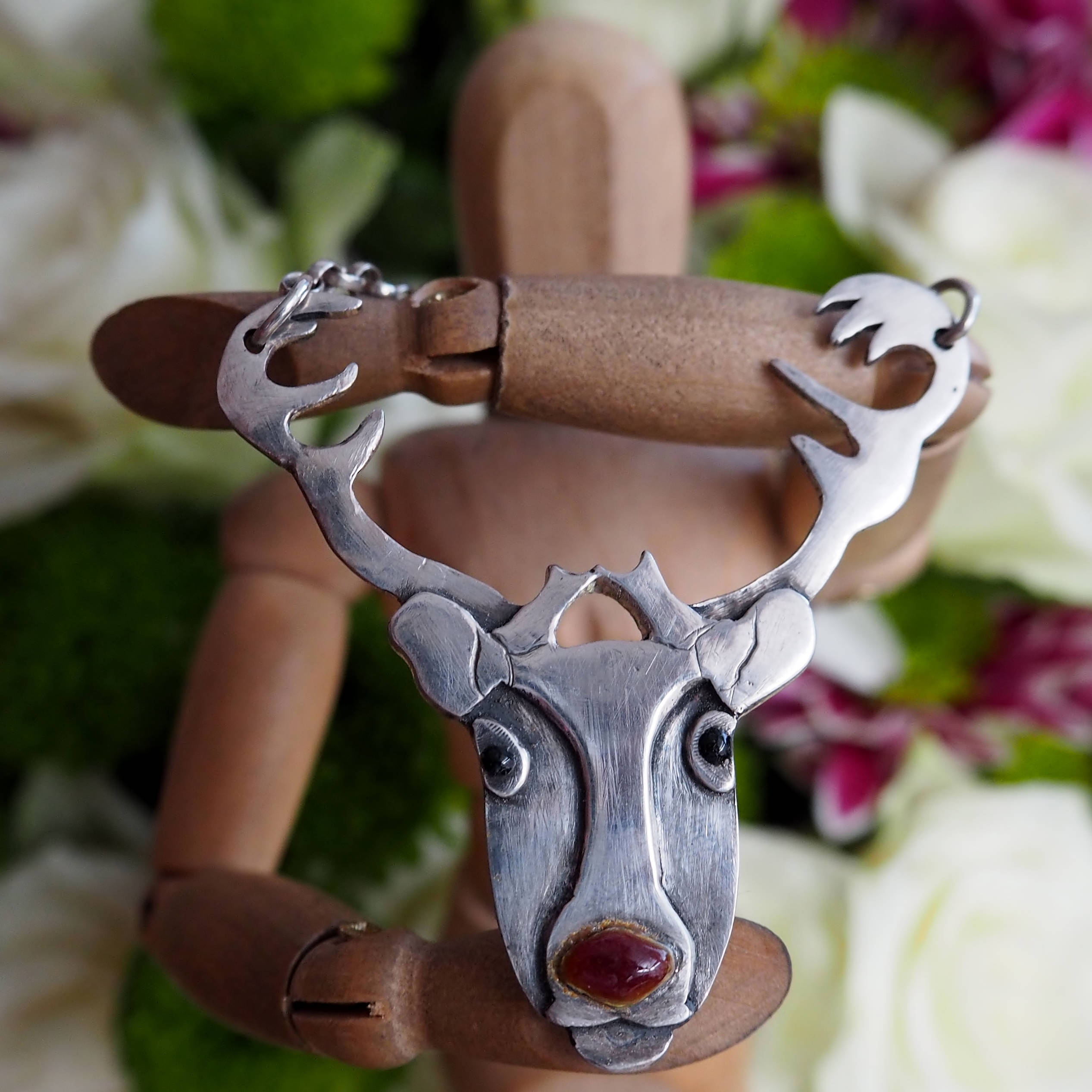 A stunning unique reindeer stag necklace handmade in fine