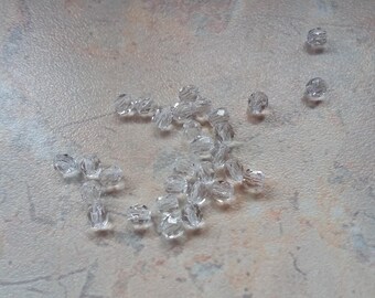 White 4 mm clear faceted glass beads