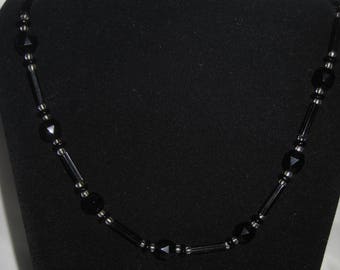16" Black beads with clear spacers