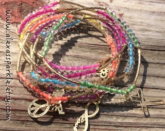 SALE: Clear Multicolor Bracelet Set with gold plated charms - Semanario pulseras transparentes multicolor con dijes de chapa de oro