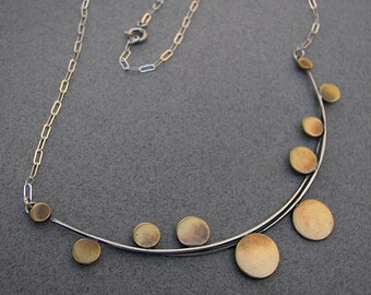 Architectural necklace: sterling-silver, modern, architectural necklace with cascading brass discs