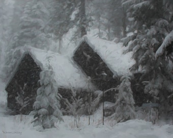 Snow covered cabin in woods