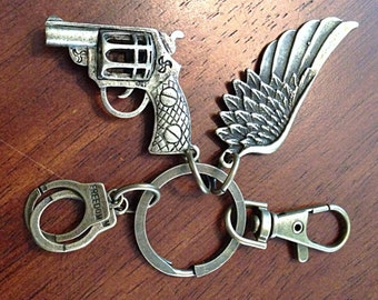 Christian keychain, Pistol Keychain, Angel Wing Keychain, Hand Gun Keychain, Handcuffs and Pistol Charm