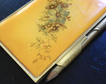 Golden notepad case and pencil
