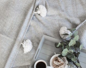handmade pompom blanket